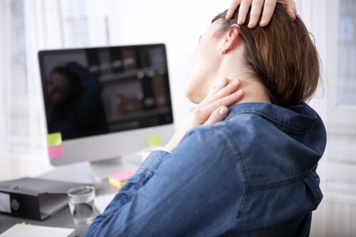 What causes neck pain and headaches? shutterstock 265380494 neck pain and headaches