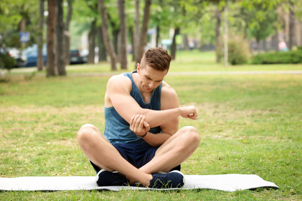 Three exercises to avoid when suffering from tennis elbow shutterstock 1106026277 exercises to avoid with tennis elbow