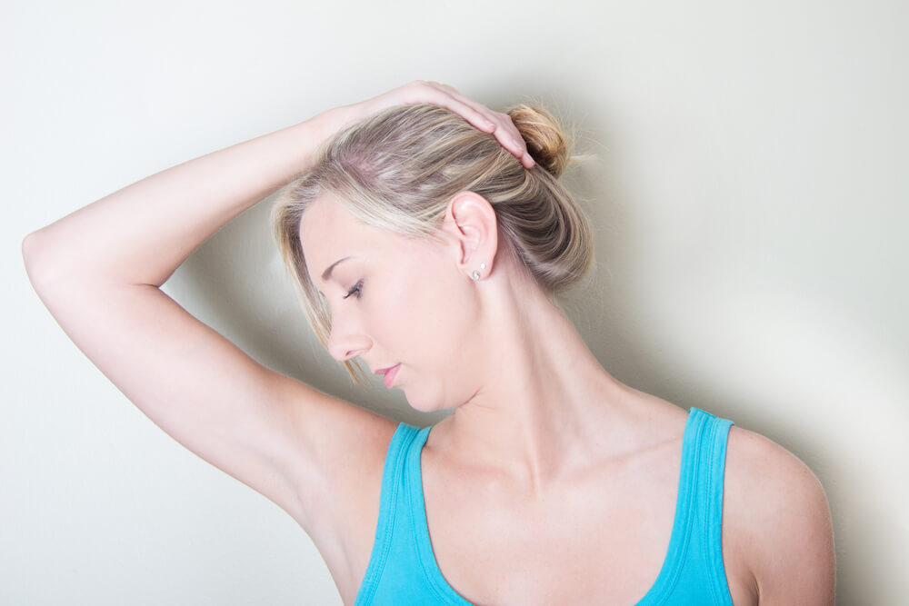 Reduce how long a stiff neck lasts with these two stretches shutterstock 159410909 how long does a stiff neck last?