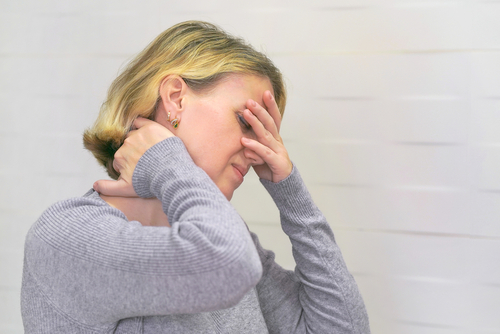 How to tell if a pinched nerve in your neck is causing your headache shutterstock 1659733897 pinched nerve in neck headache