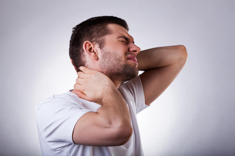 Can a pinched nerve be the cause of my recurring headaches? shutterstock 176265392 can a pinched nerve cause headaches