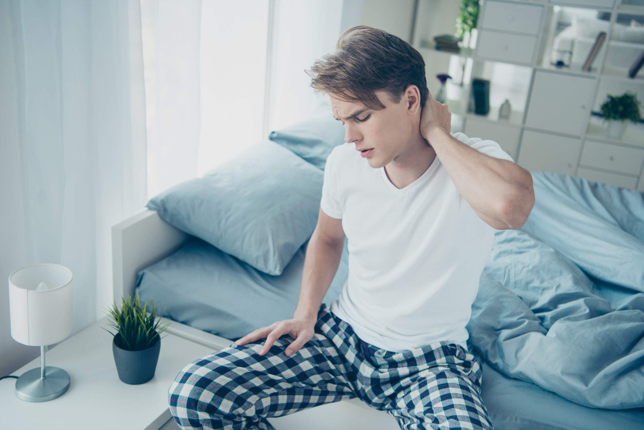 How to Relieve Neck Pain From Sleeping Wrong AdobeStock 293098361 scaled 1 How to Relieve Neck Pain From Sleeping Wrong