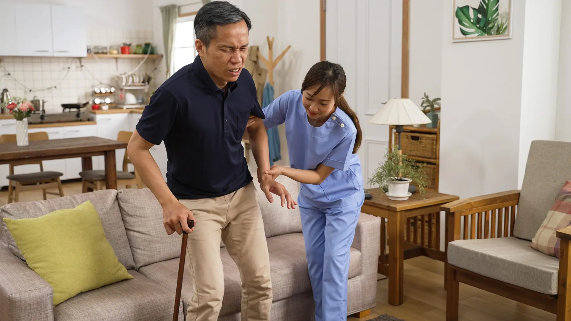 Can physical therapy provide pain relief while you're waiting for a knee replacement? elderly male with knee pain using cane with help 2023 01 06 10 19 57 utc scaled Can physical therapy provide pain relief while you’re waiting for a knee replacement?