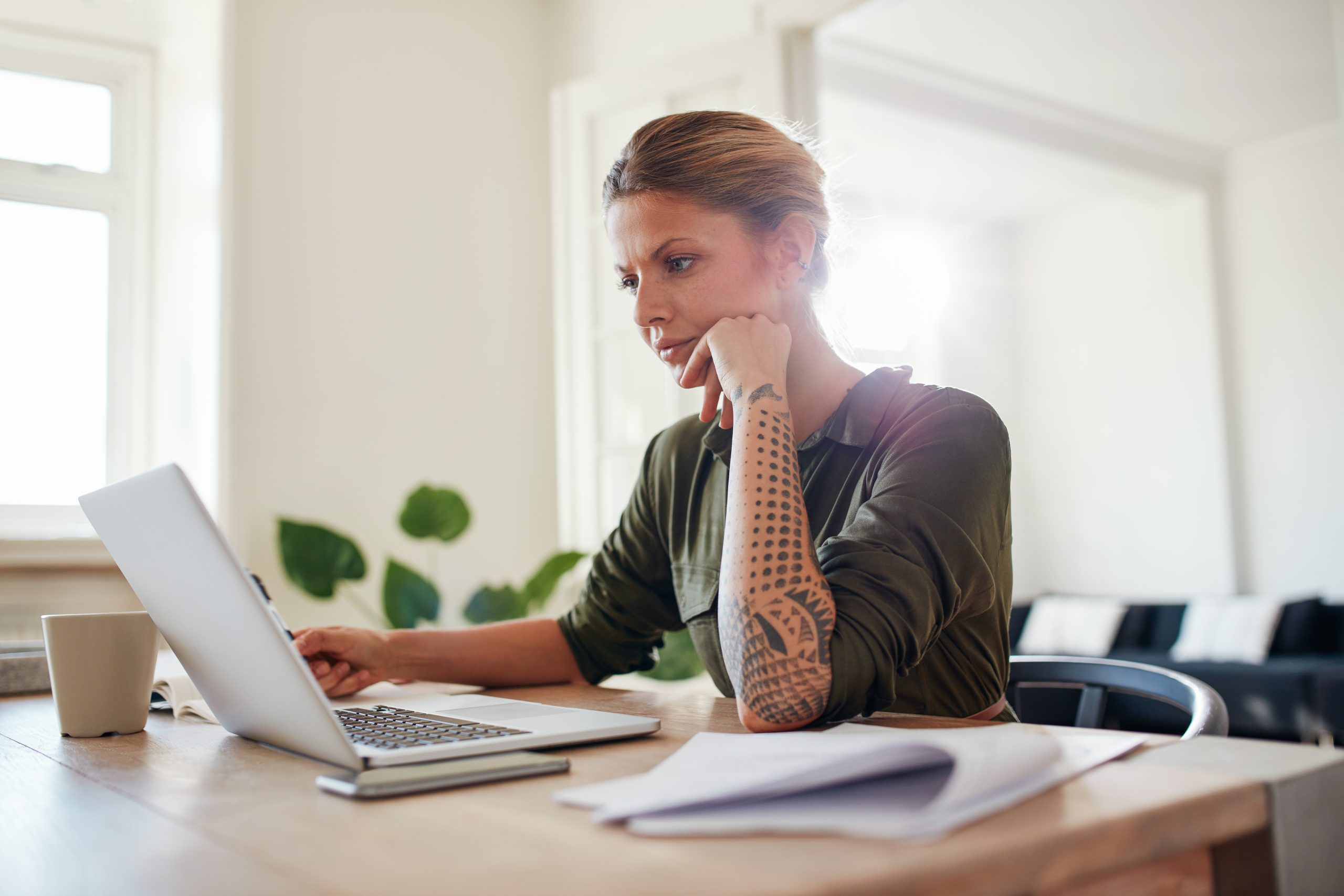3 must-haves to build a profitable PT clinic young woman looking at laptop seriously 2022 02 02 05 05 43 utc scaled 3 must-haves to build a profitable PT clinic
